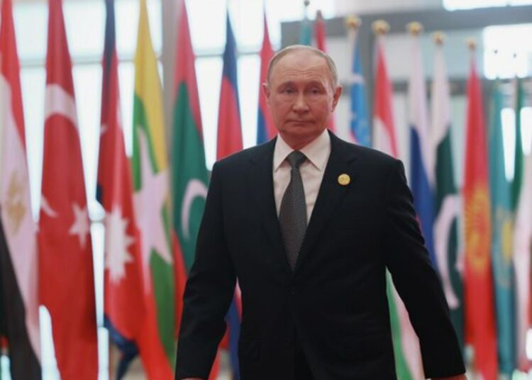 В Китае Путин упомянул российский подход к преодолению украинского кризиса