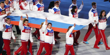 Российские спортсмены смогут выступать с флагом и гимном: подробности